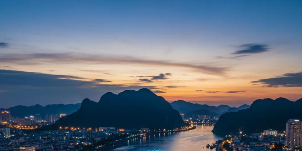 The Dragon Bridge glowing over the Han River in Da Nang at night