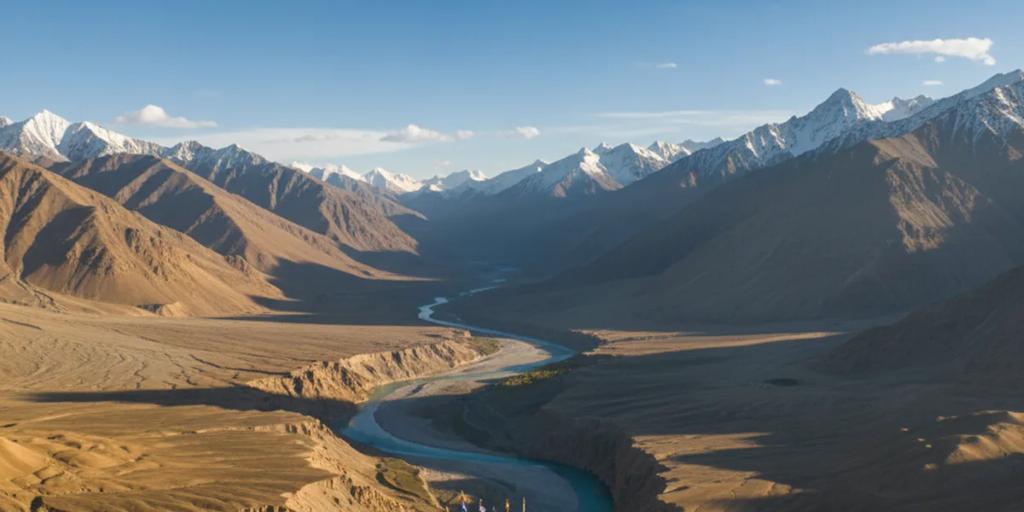 A whitewashed Himalayan monastery perched on a ridge above the Indus valley in Ladakh